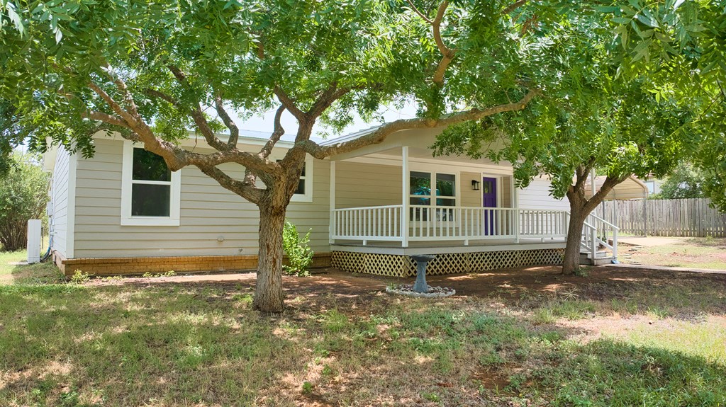 425 Post Hill Street Mason, TX 76856 - Photo 3 of 18 a view of a house with a yard