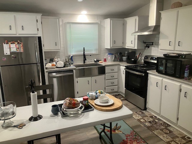 425 Post Hill Street Mason, TX 76856 - Photo 8 of 18 a kitchen with a sink stove and cabinets