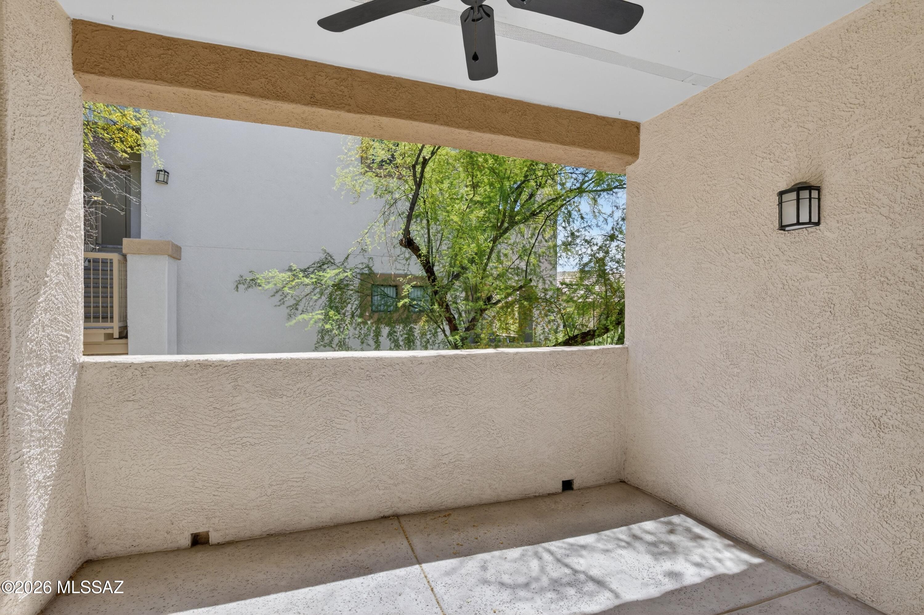 2550 East River Road, Unit 4204 Tucson, AZ 85718 - Photo 30 of 36 a view of balcony with wooden floor