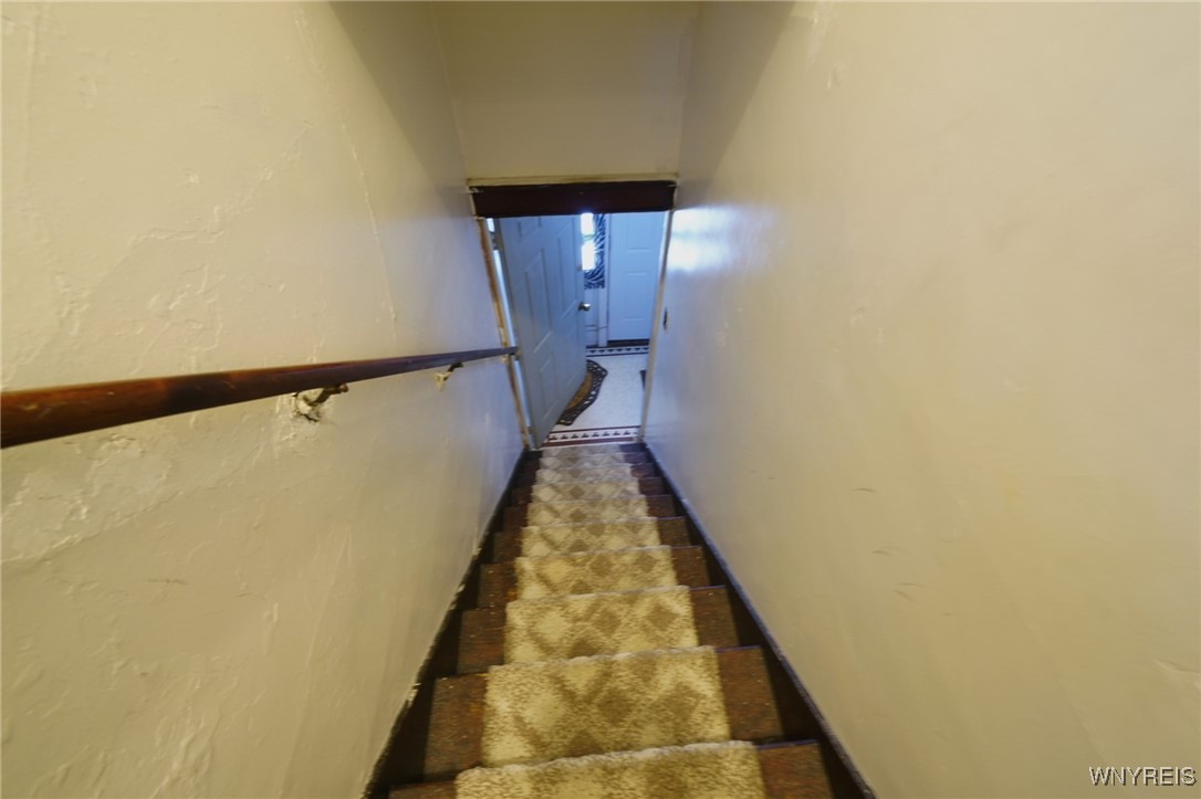 82 Montclair Avenue Buffalo, NY 14215 - Photo 9 of 24 Stairwell to upstairs