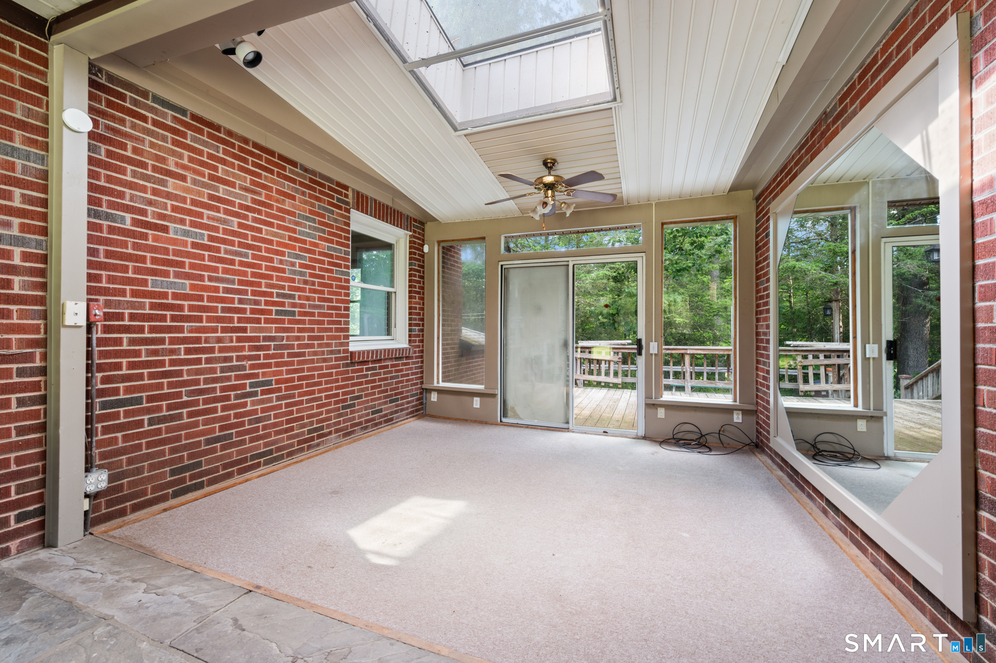 152 Ramstein Road New Hartford, CT 06057 - Photo 15 of 20 a view of an empty room with windows