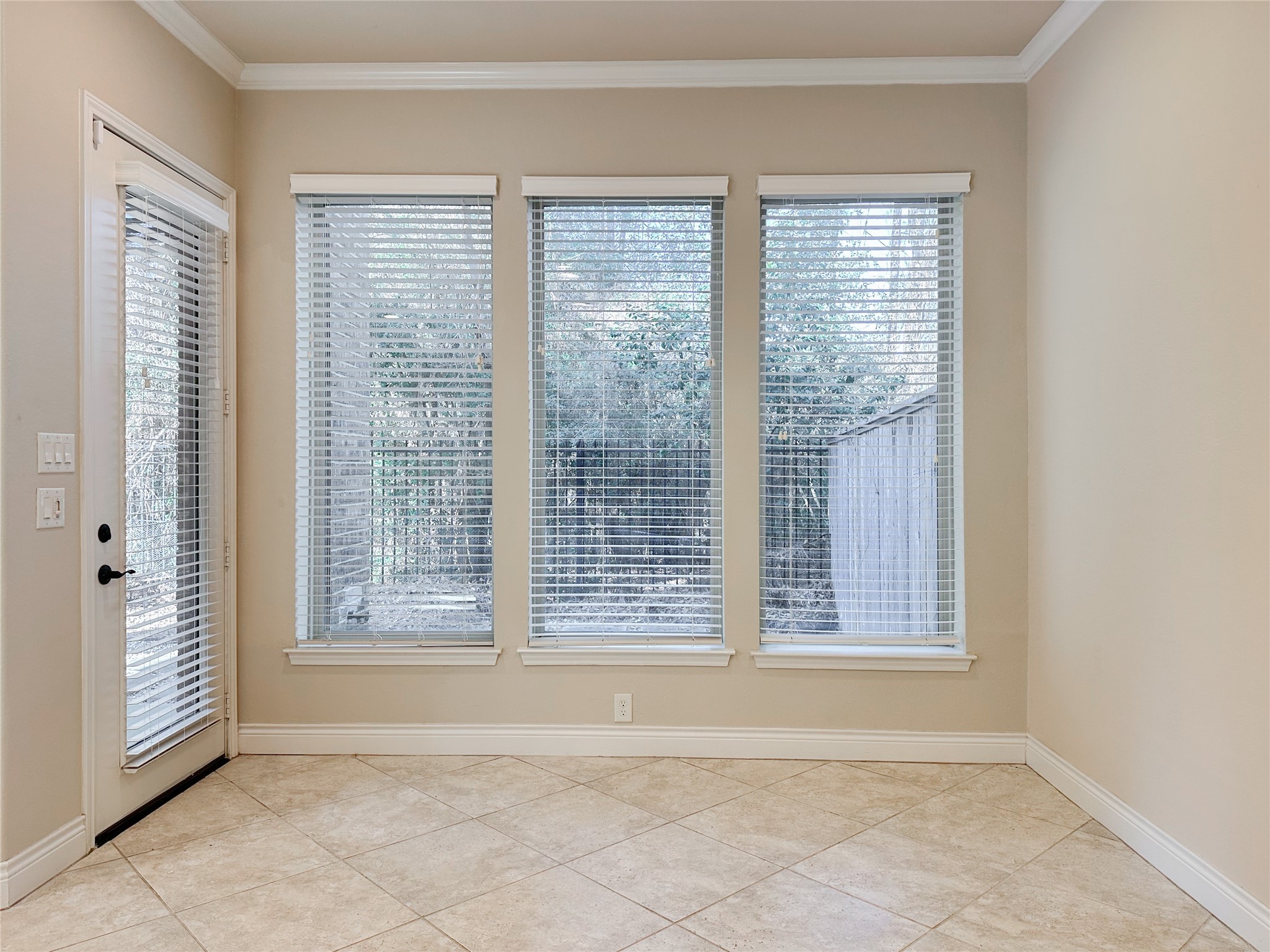23 Jonquil Place Tomball, TX 77375 - Photo 25 of 50 a view of an empty room with a window