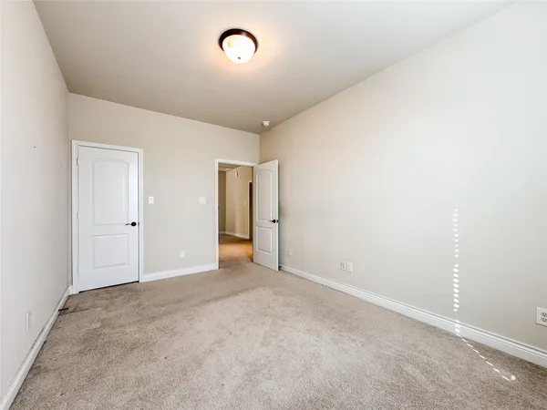 an empty room with an entryway