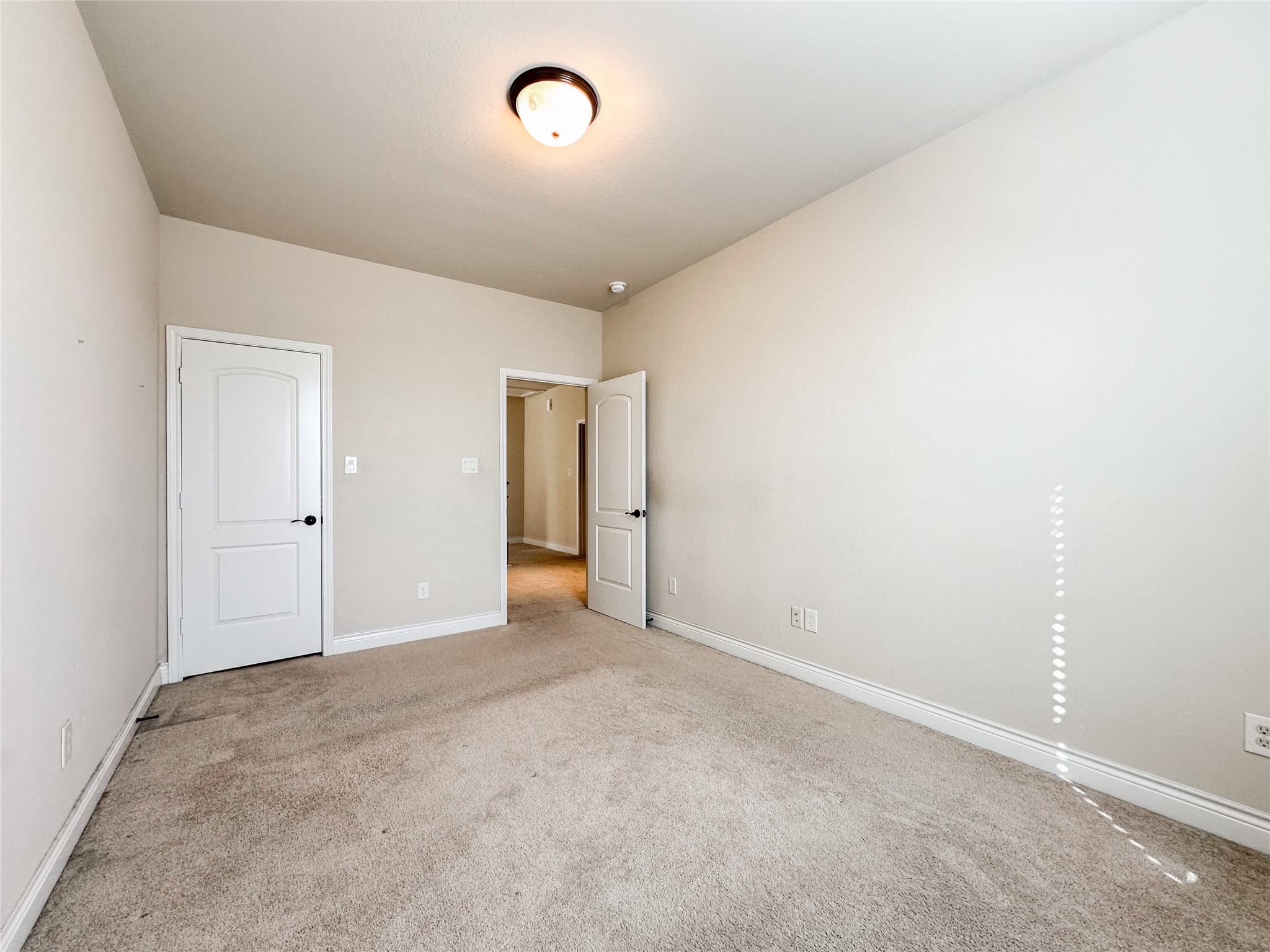 23 Jonquil Place Tomball, TX 77375 - Photo 37 of 50 an empty room with an entryway