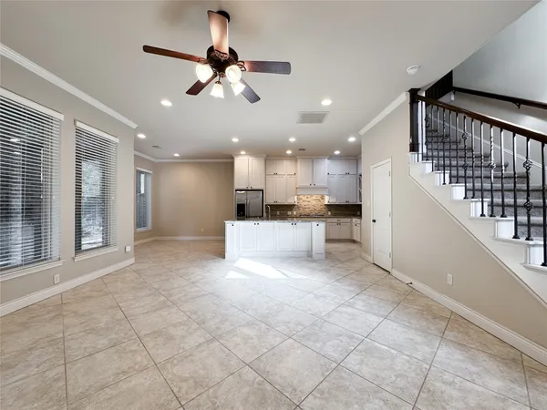 a view of a kitchen with a sink and microwave