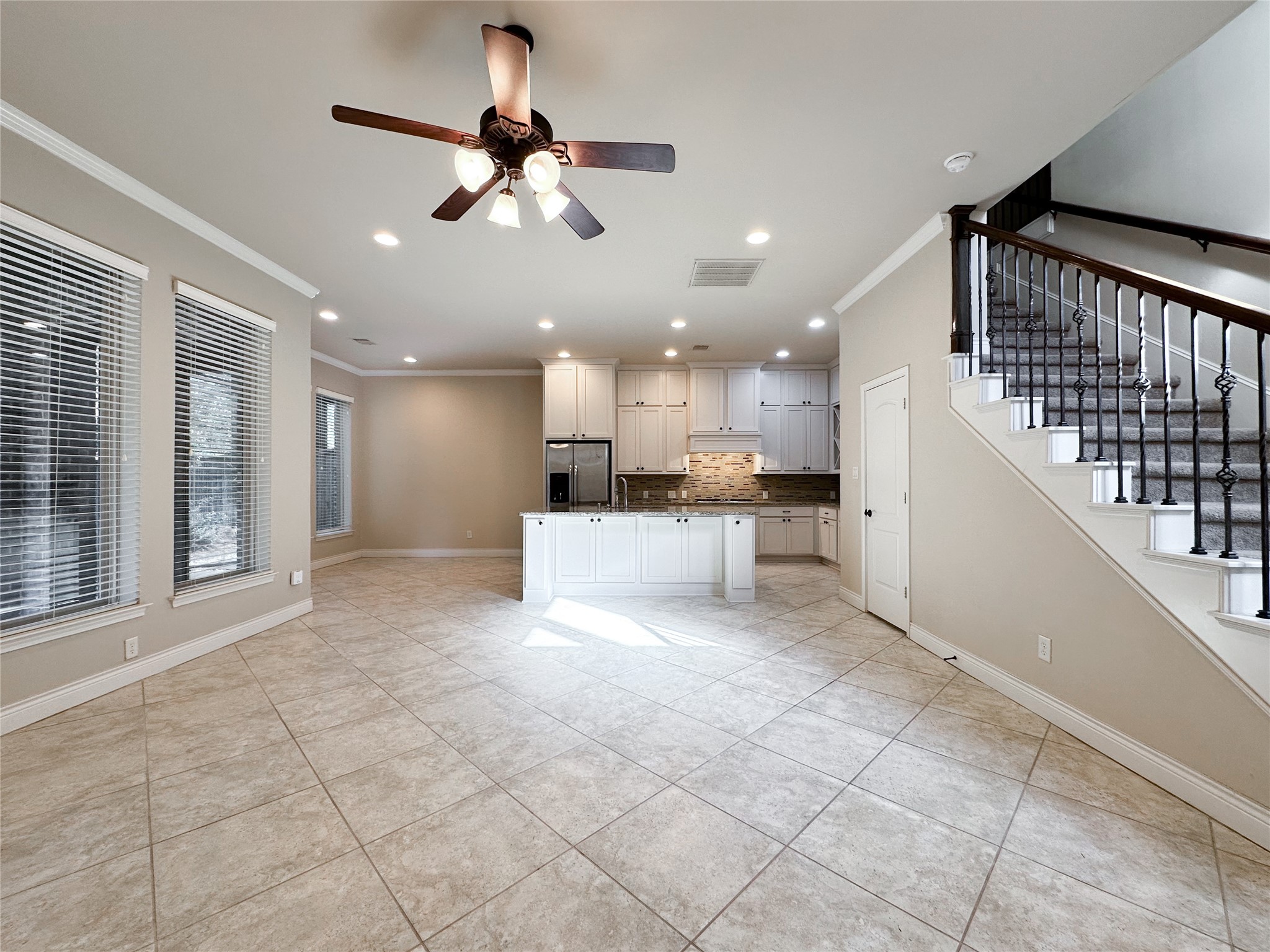 23 Jonquil Place Tomball, TX 77375 - Photo 9 of 50 a view of a kitchen with a sink and microwave