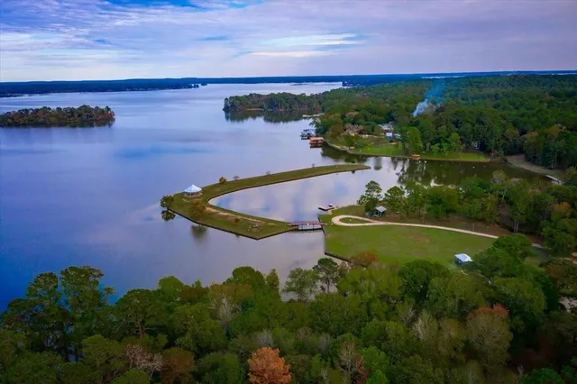 a view of a lake and front yard