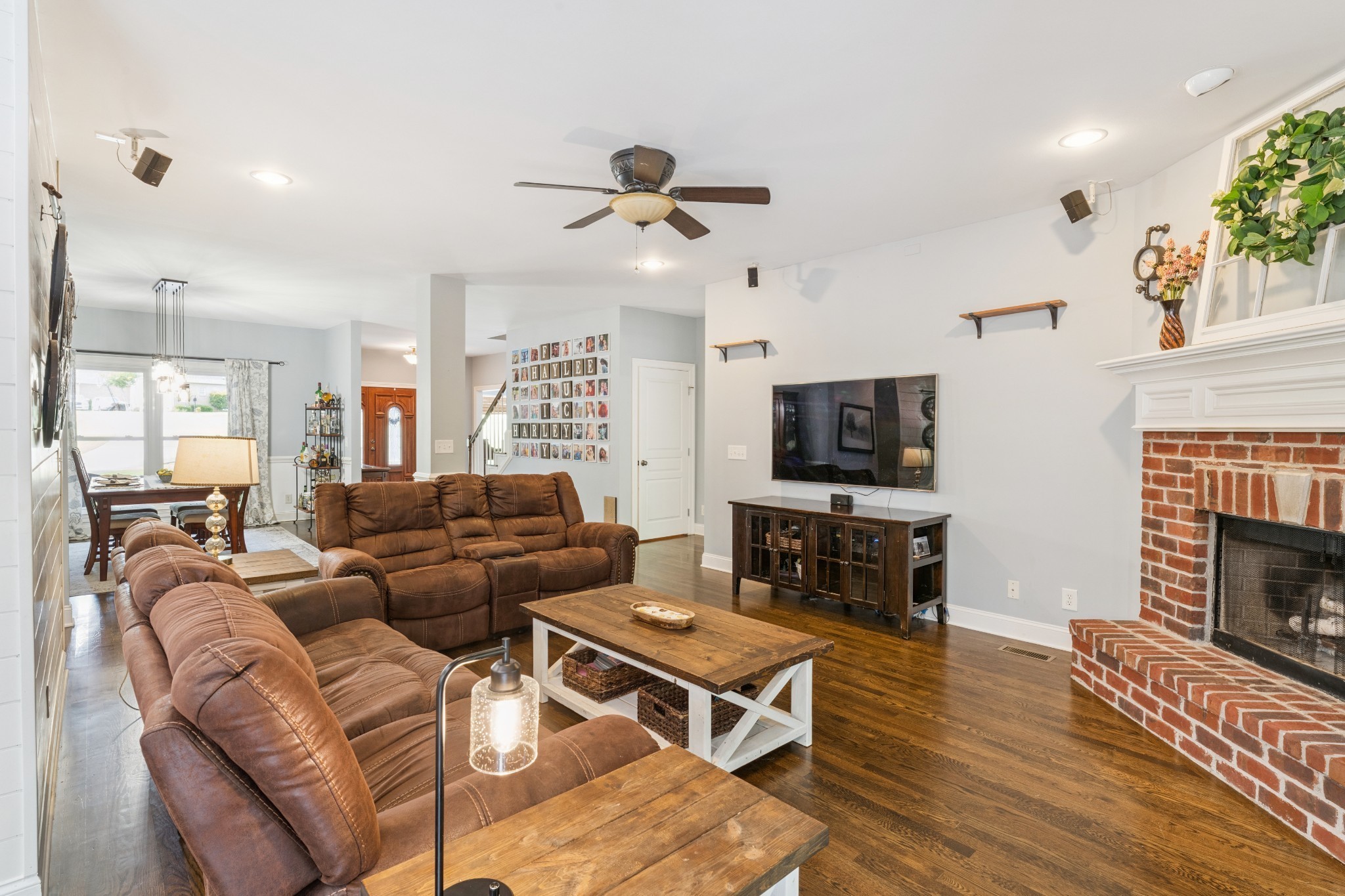 238 Ridgewater Way Mount Juliet, TN 37122 - Photo 15 of 67 a living room with furniture a flat screen tv and a fireplace