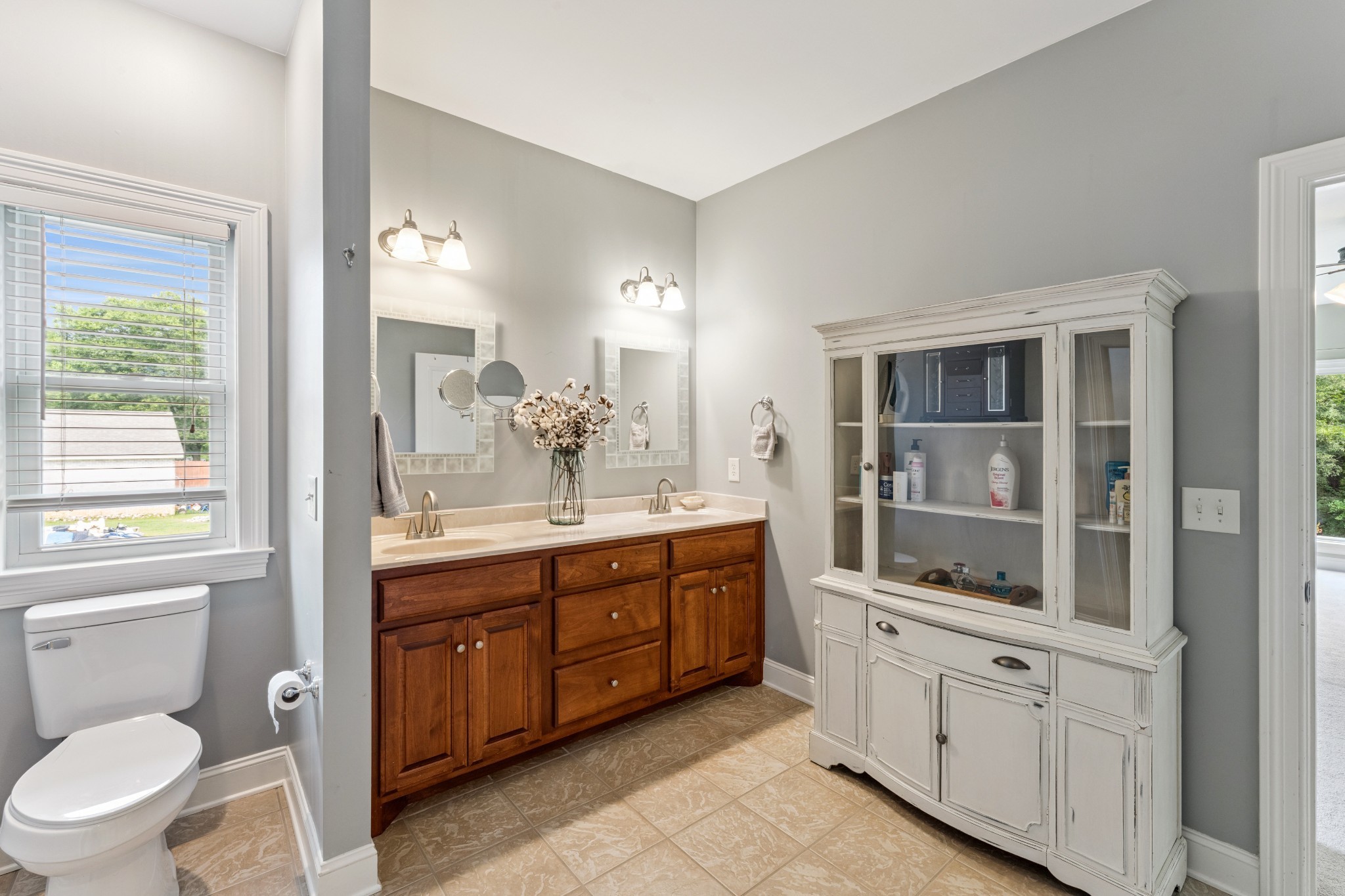 238 Ridgewater Way Mount Juliet, TN 37122 - Photo 21 of 67 a bathroom with a double vanity sink a toilet and a mirror