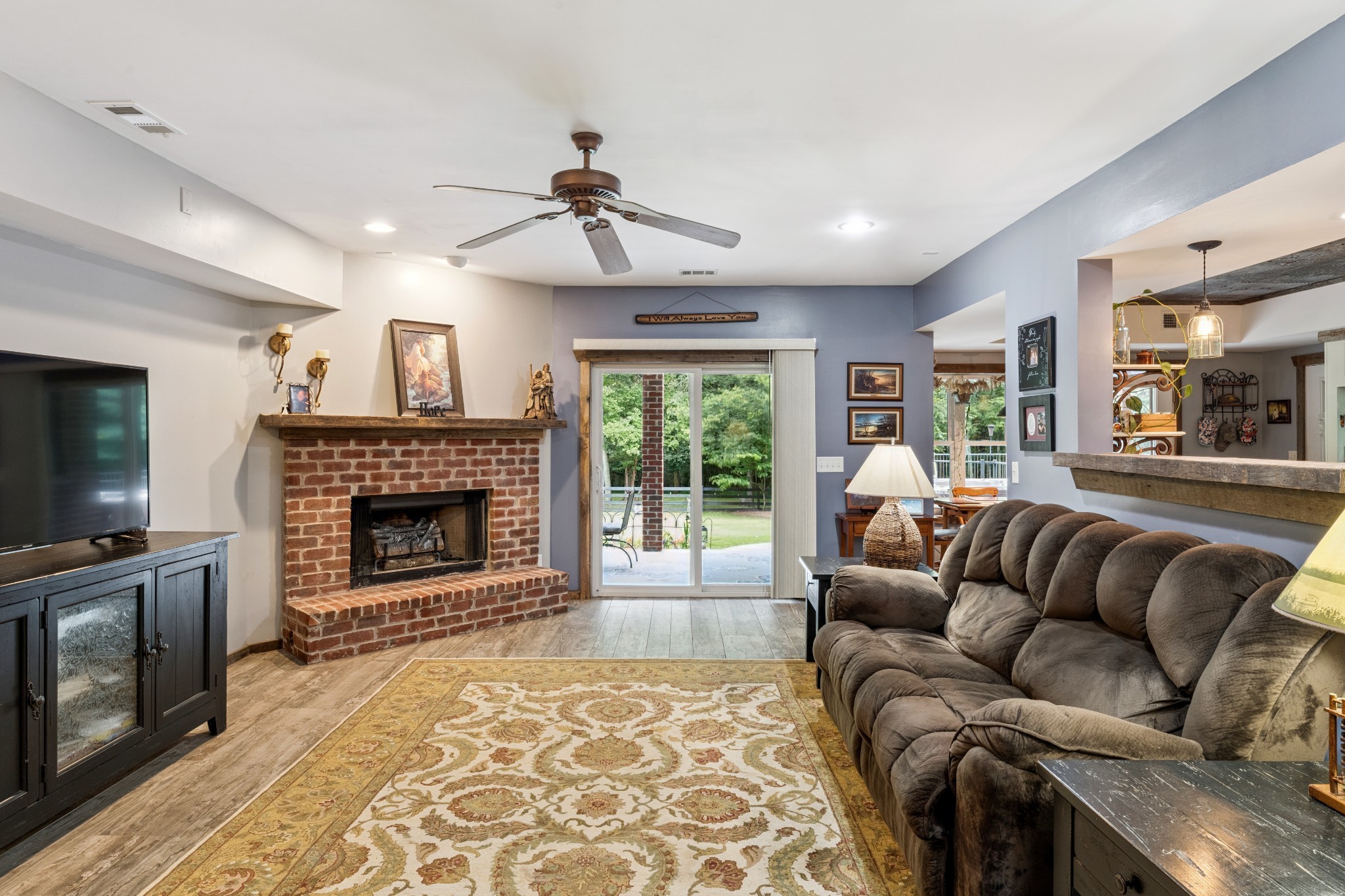 238 Ridgewater Way Mount Juliet, TN 37122 - Photo 36 of 67 a living room with furniture and a fireplace
