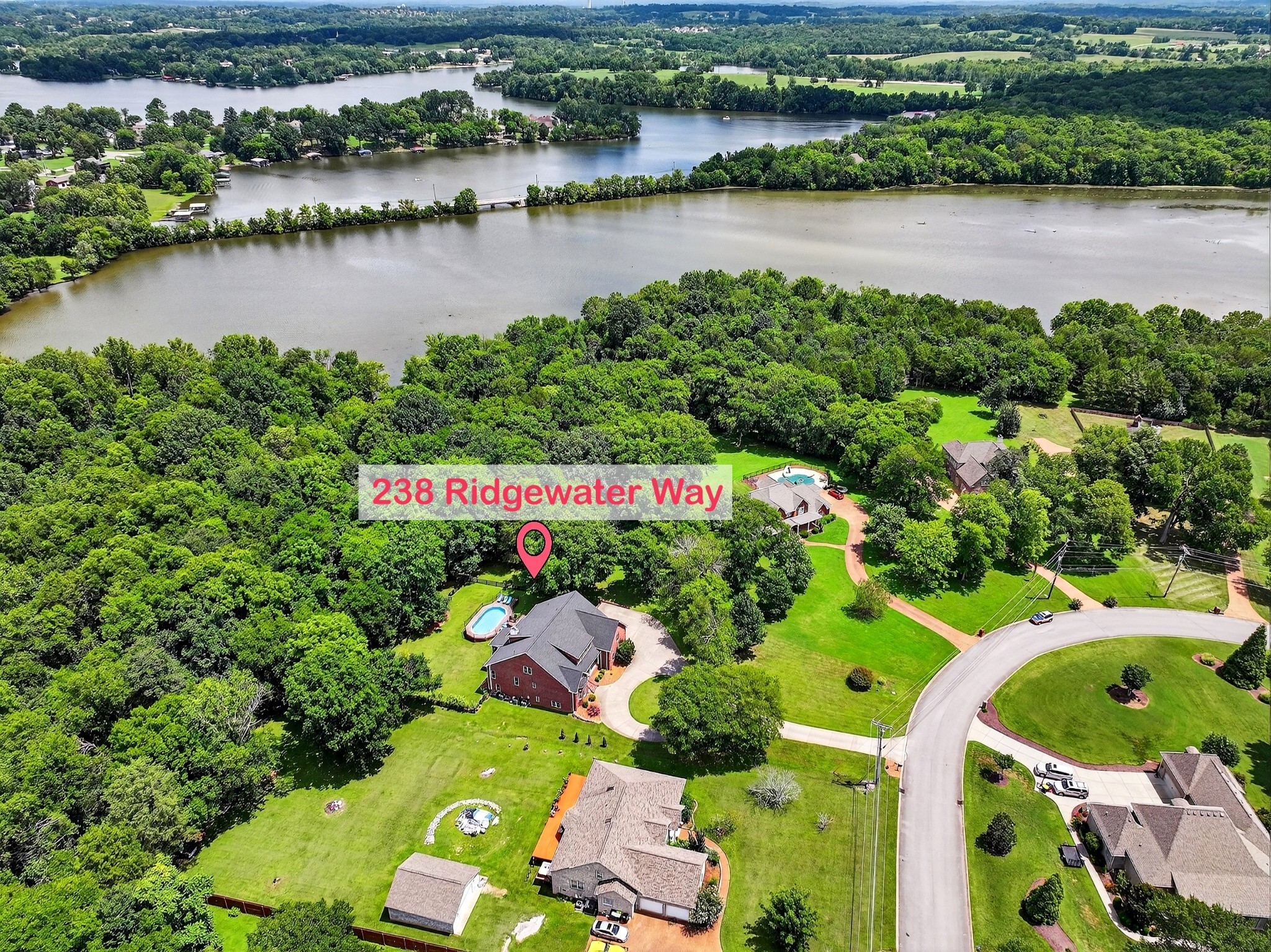 238 Ridgewater Way Mount Juliet, TN 37122 - Photo 65 of 67 an aerial view of a house with outdoor space and lake view