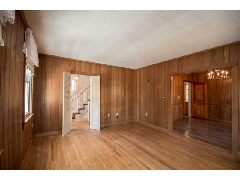459 Spring Street Newport, RI 02840 - Photo 6 of 25 Living Room. living room looking into dining room