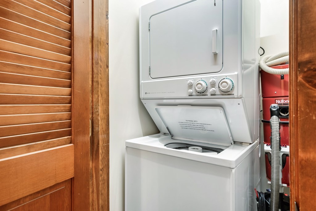 2044 Hickory Ridge Way, Unit 334 Sevierville, TN 37862 - Photo 15 of 28 a utility room with dryer and washer