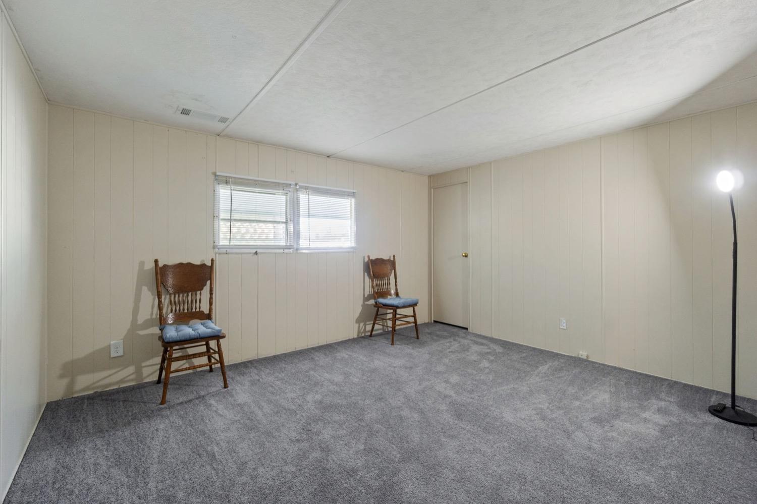 1500 Villa Avenue Clovis, CA 93612 - Photo 17 of 28 a room with gym equipment and a window