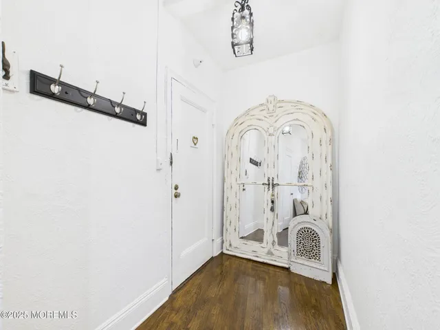 a view of a livingroom with wooden floor