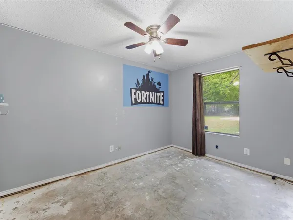 a view of a park with large trees