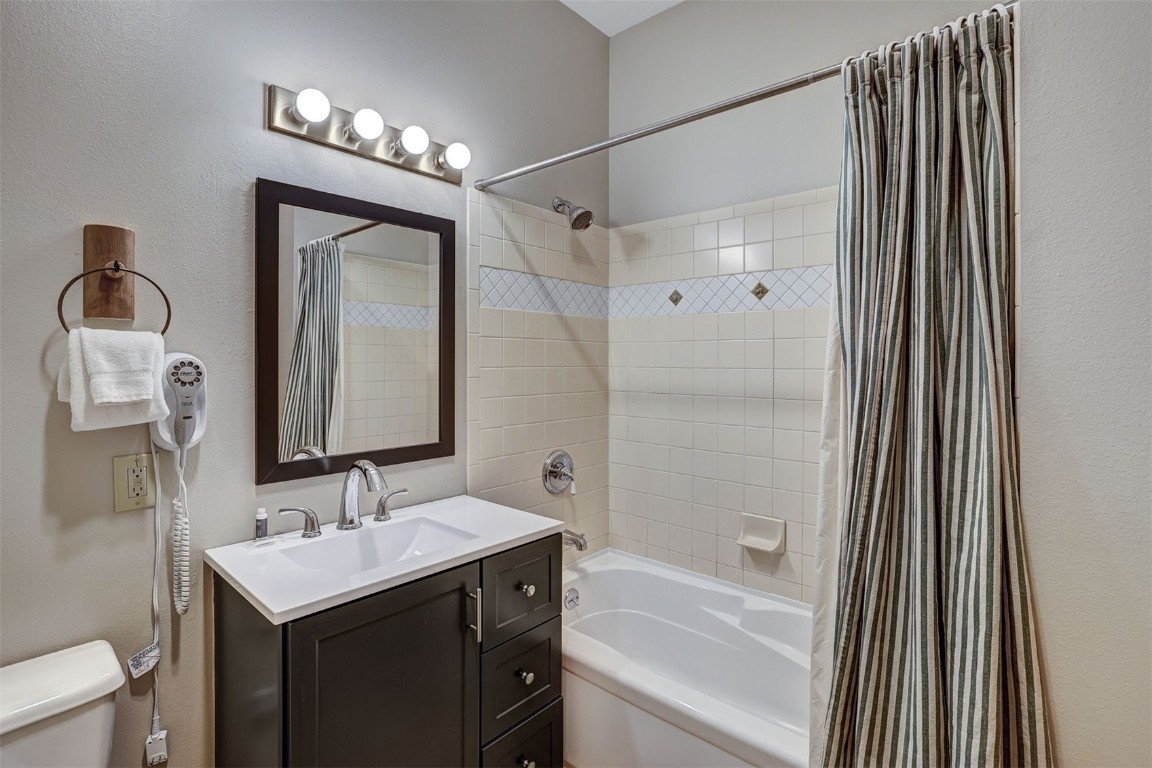 91 River Run Road, Unit 8134 Keystone, CO 80435 - Photo 19 of 30 a bathroom with a bath tub sink mirror and vanity