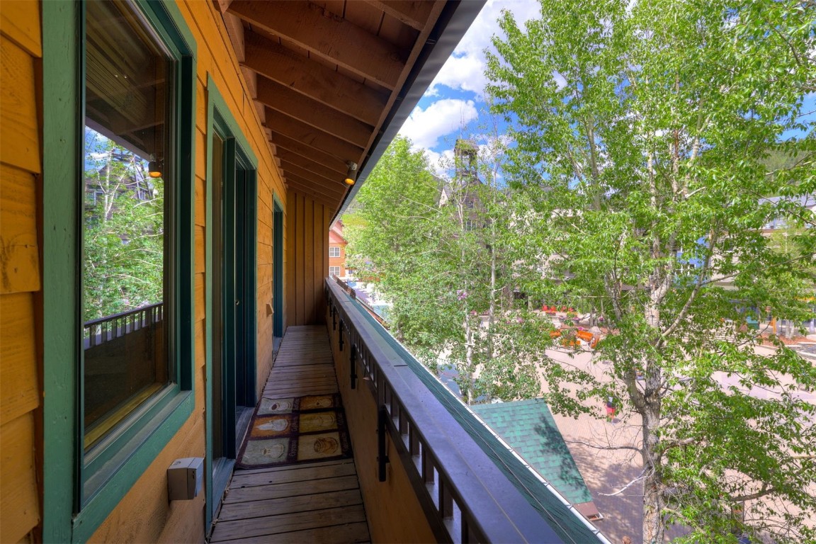 91 River Run Road, Unit 8134 Keystone, CO 80435 - Photo 22 of 30 a view of balcony and wooden floor