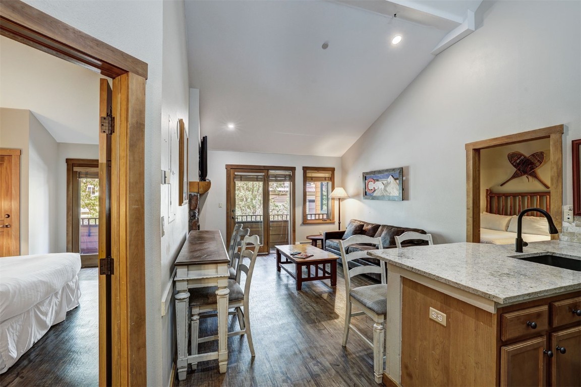 91 River Run Road, Unit 8134 Keystone, CO 80435 - Photo 5 of 30 a view of a kitchen with dining table and chairs