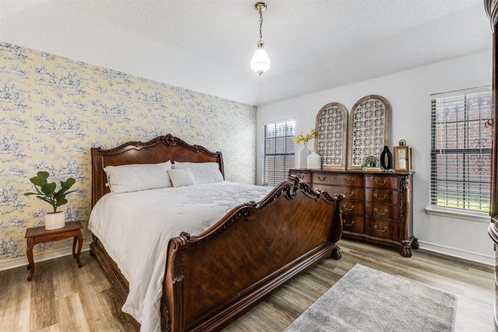 2020 Meadowbrook Drive Mesquite, TX 75149 - Photo 14 of 31 Primary bedroom with Ensuite Bathroom.