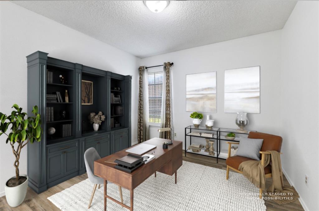 2020 Meadowbrook Drive Mesquite, TX 75149 - Photo 18 of 31 Bedroom 2 virtually staged to show possibilities.