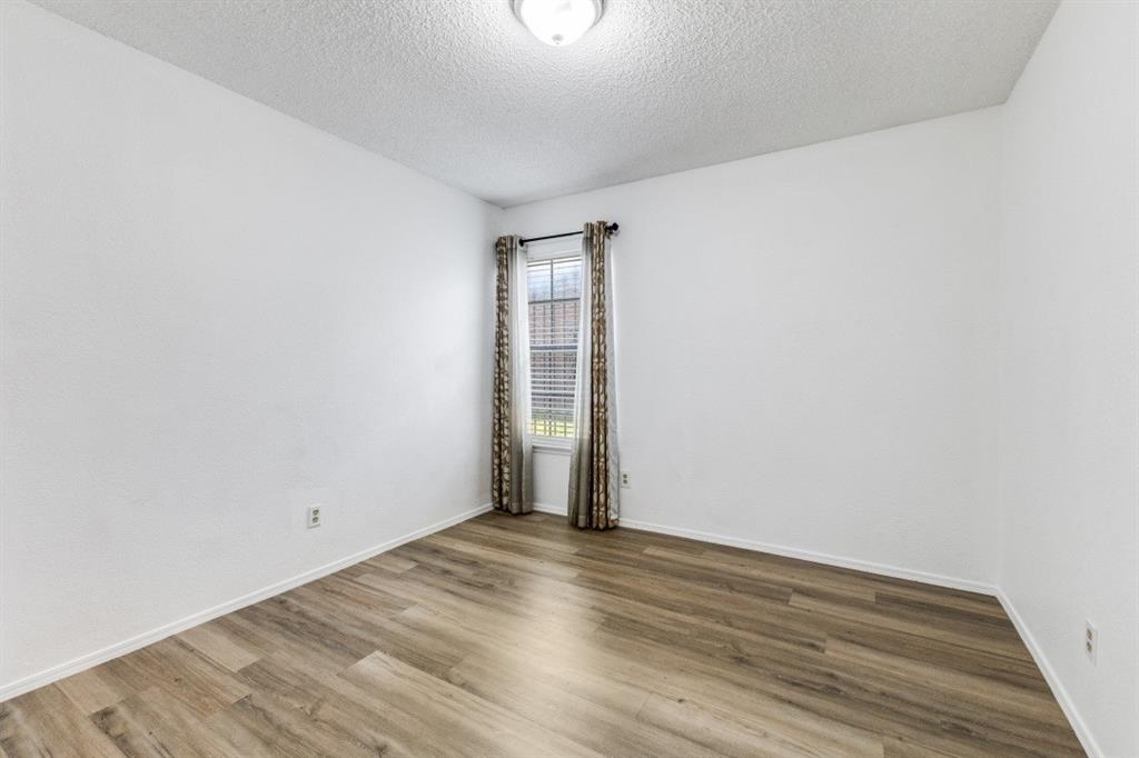 2020 Meadowbrook Drive Mesquite, TX 75149 - Photo 19 of 31 Bedroom 2.