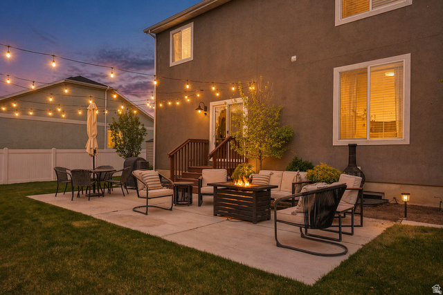 7685 Timber Country Road Eagle Mountain, UT 84005 - Photo 29 of 39 Spacious concrete patio with string lighting overhead
