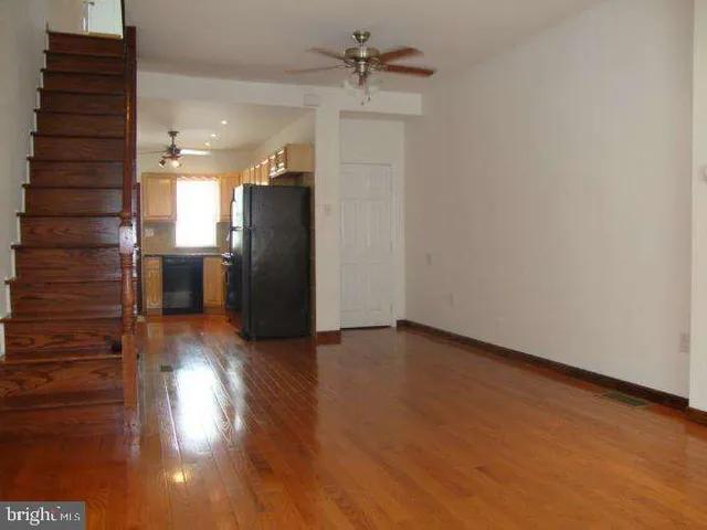 a view of a kitchen with a sink and a dishwasher