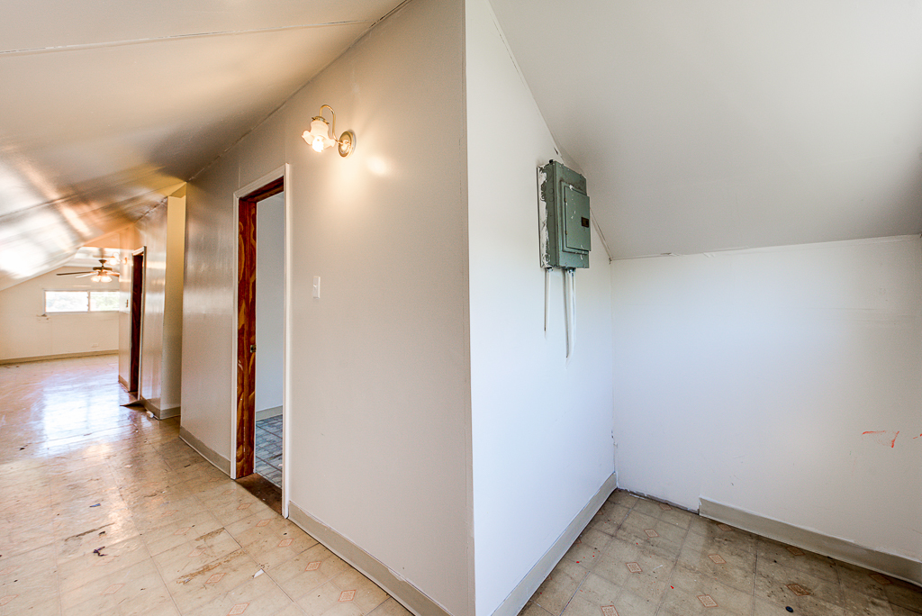 8024 South Perry Avenue Chicago, IL 60620 - Photo 19 of 37 a view of hallway with stairs