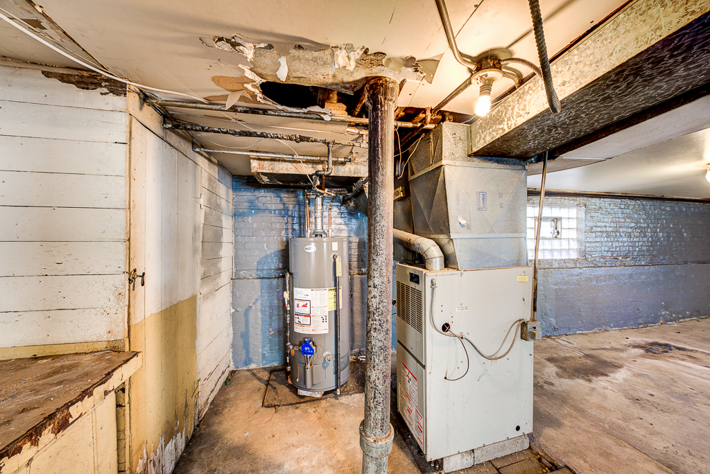 8024 South Perry Avenue Chicago, IL 60620 - Photo 29 of 37 a view of a storage & utility room