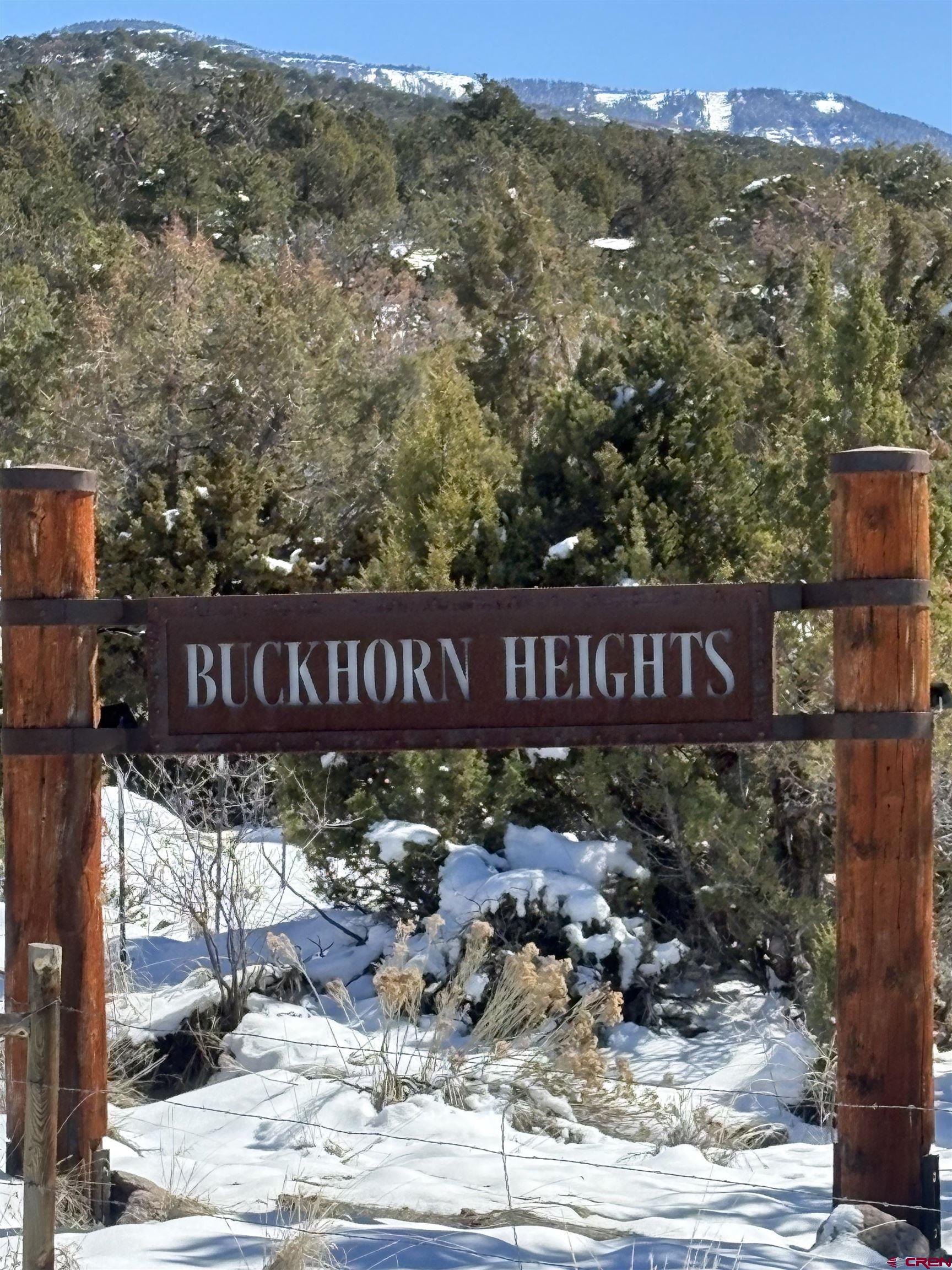 Tbd Tbd Road Montrose, CO 81403 - Photo 4 of 11 a view of a street with a building in the background