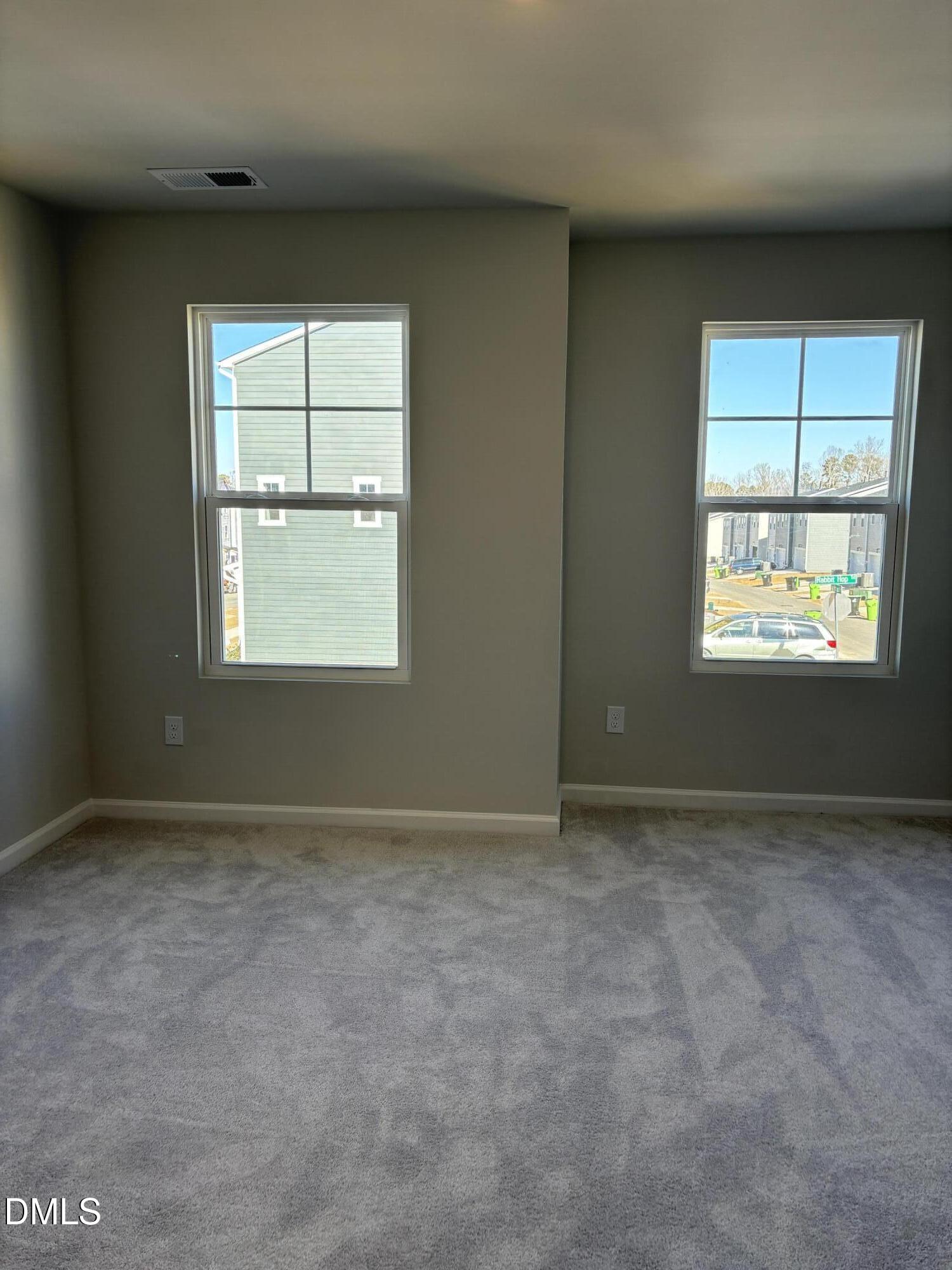 2011 Rabbit Hop Trail Apex, NC 27502 - Photo 11 of 27 an empty room with a window