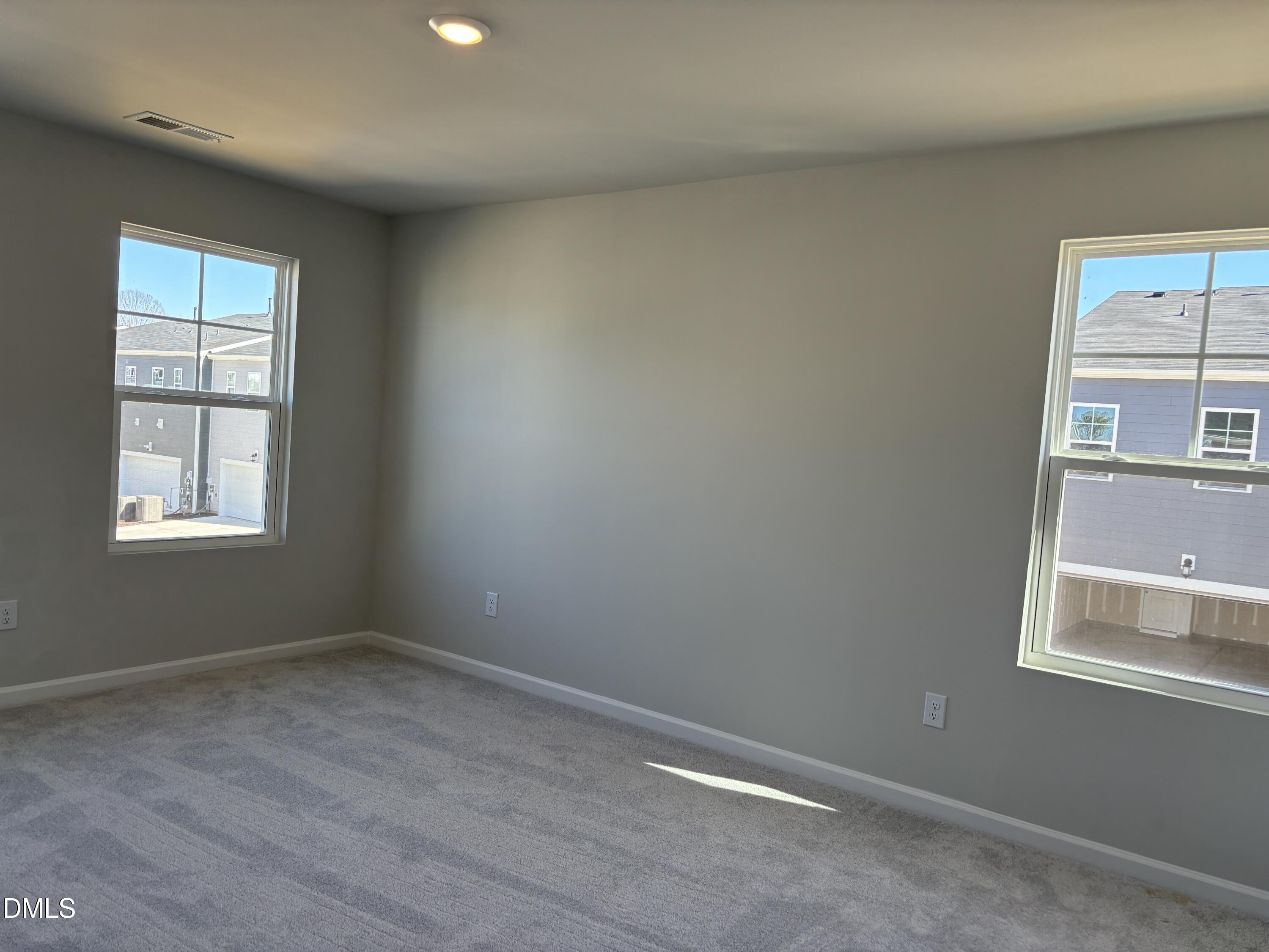 2011 Rabbit Hop Trail Apex, NC 27502 - Photo 13 of 27 an empty room with a window
