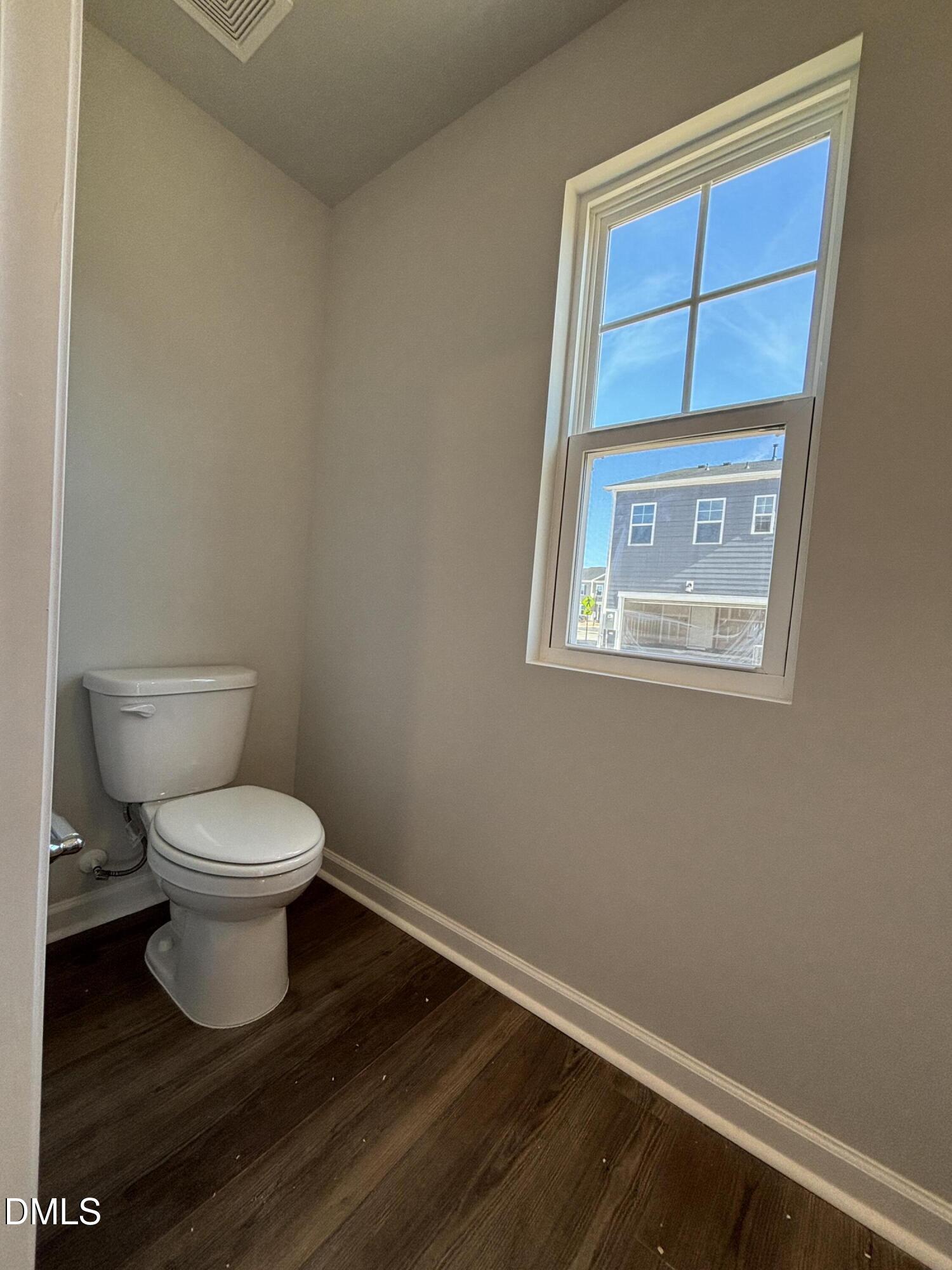 2011 Rabbit Hop Trail Apex, NC 27502 - Photo 22 of 27 a bathroom with a toilet