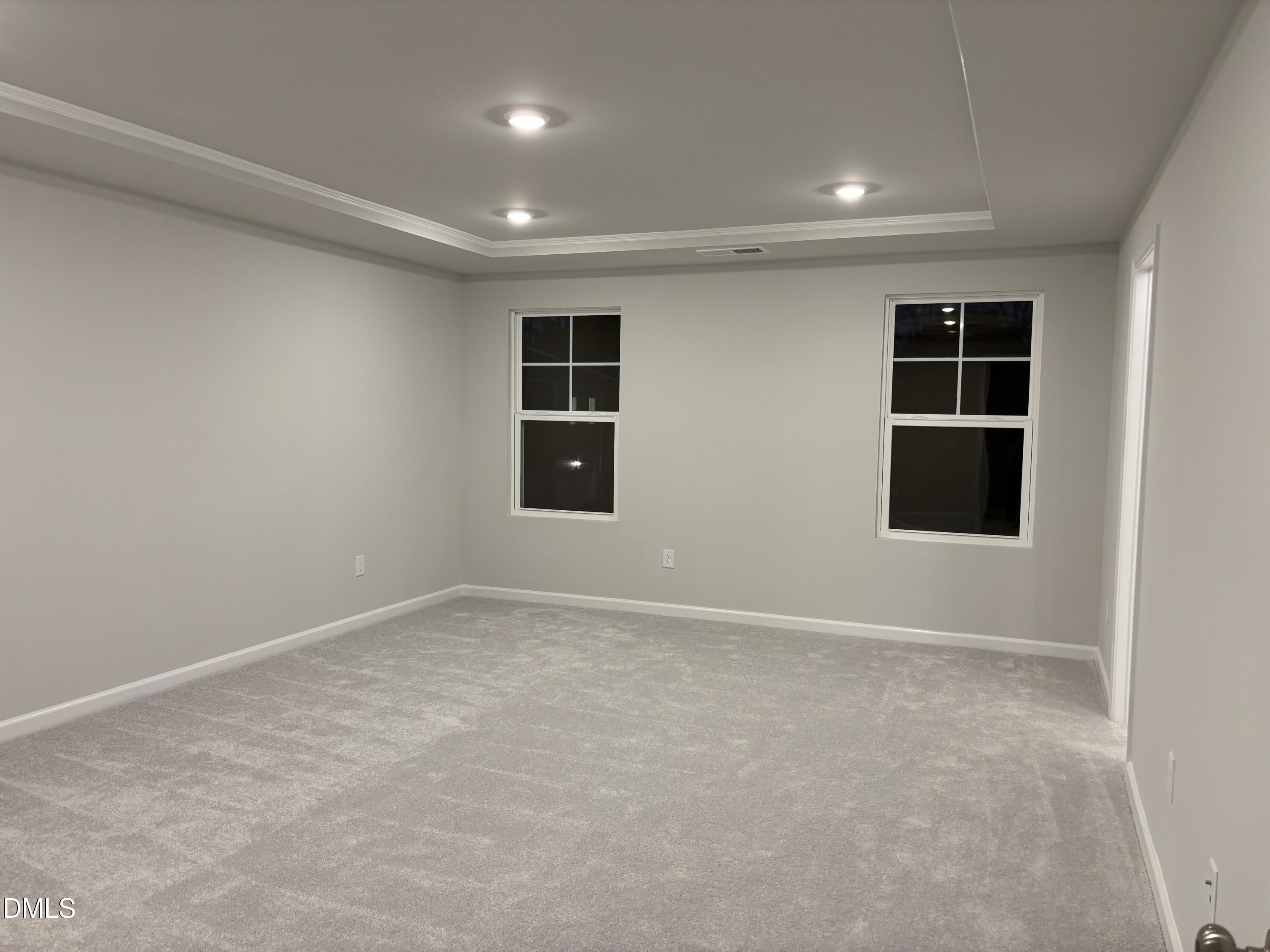 2011 Rabbit Hop Trail Apex, NC 27502 - Photo 9 of 27 an empty room with windows