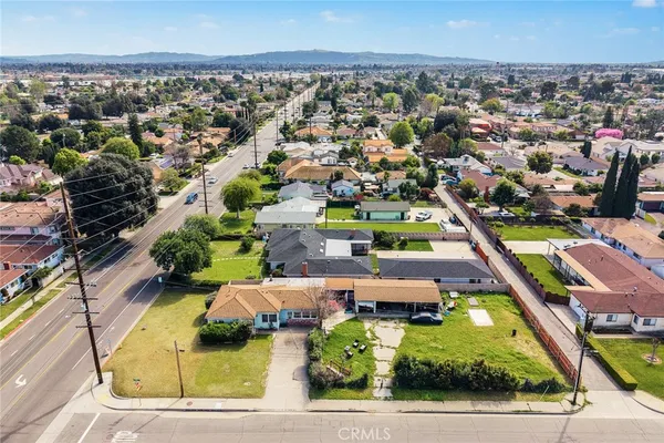 an aerial view of a house with a garden