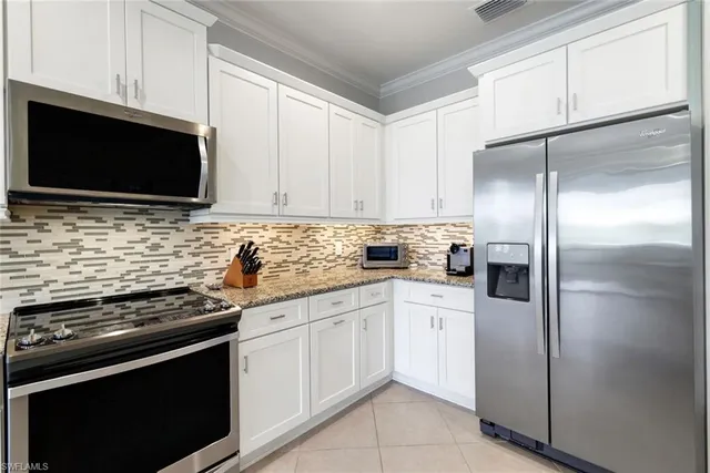 $485,000 | 12045 Covent Garden Court, Unit 2101, Naples, FL 34120