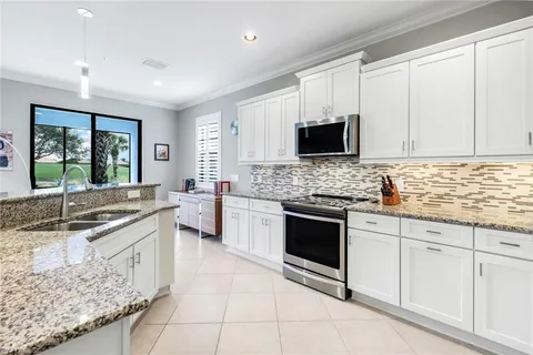 $485,000 | 12045 Covent Garden Court, Unit 2101, Naples, FL 34120