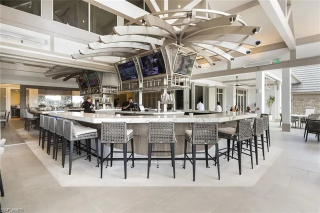 $485,000 | 12045 Covent Garden Court, Unit 2101, Naples, FL 34120