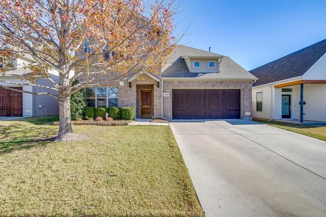 a front view of building with yard