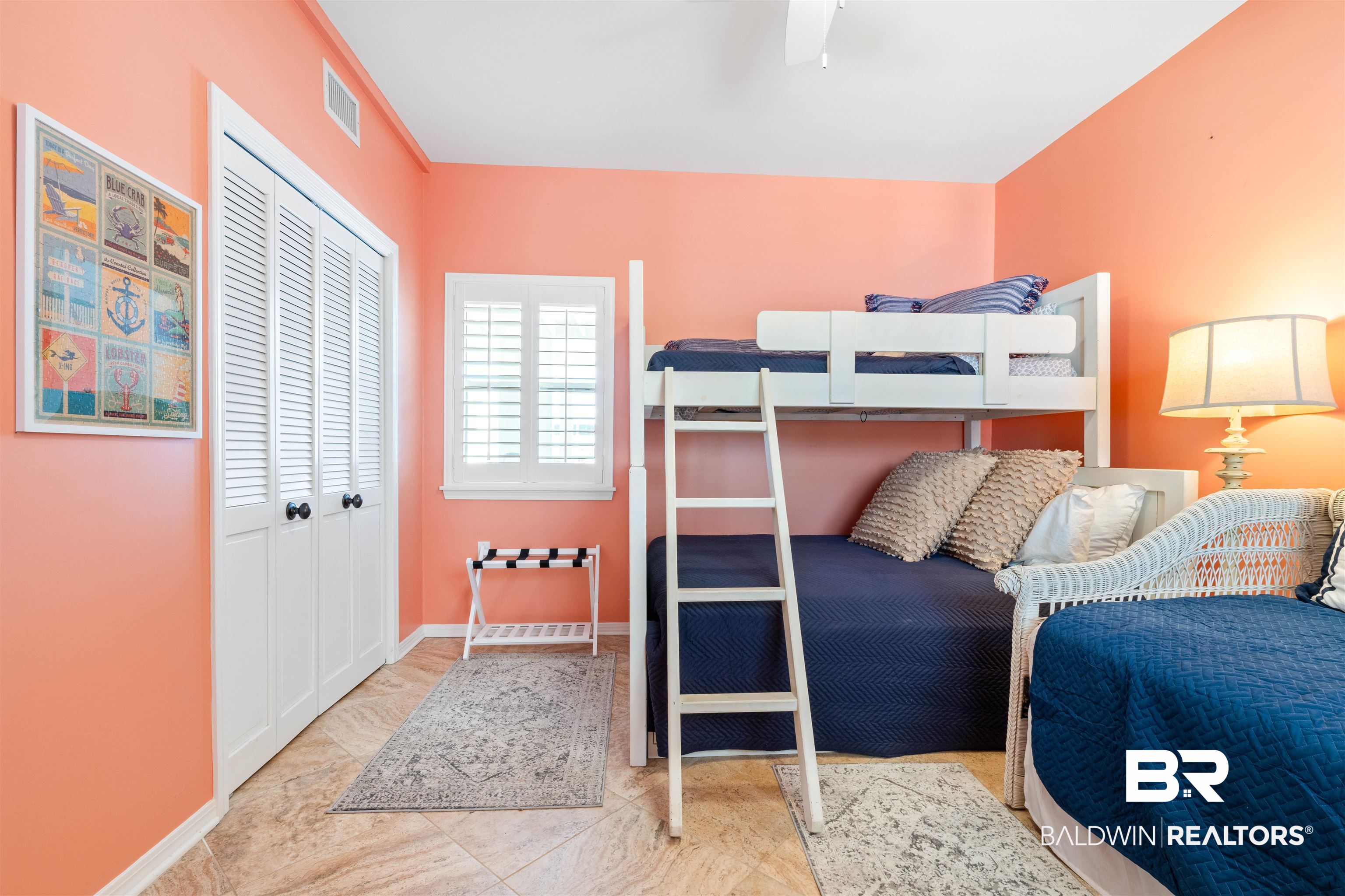32315 River Road Orange Beach, AL 36561 - Photo 49 of 68 Bedroom featuring a closet and a ceiling fan