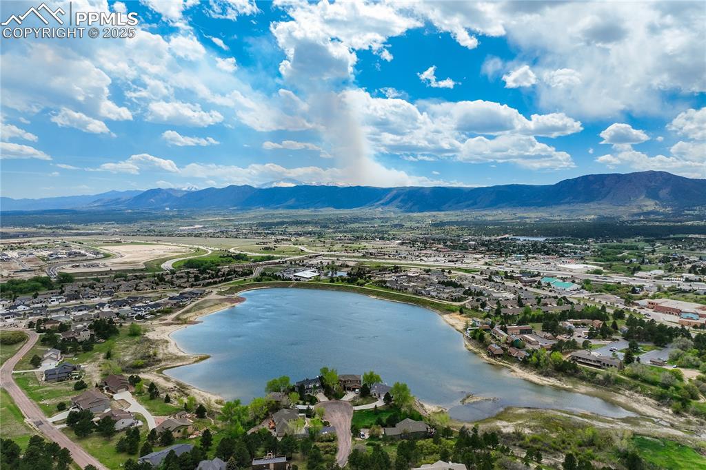 17960 Smugglers Road Monument, CO 80132 - Photo 18 of 31 a view of a city with mountains in the background