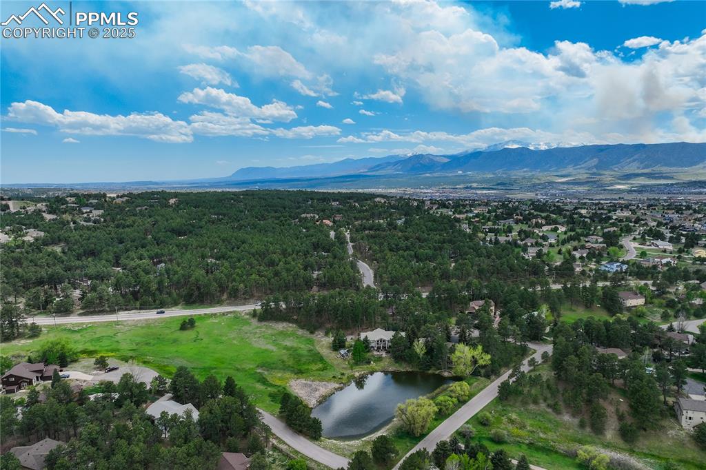 17960 Smugglers Road Monument, CO 80132 - Photo 22 of 31 a view of a yard with an outdoor seating