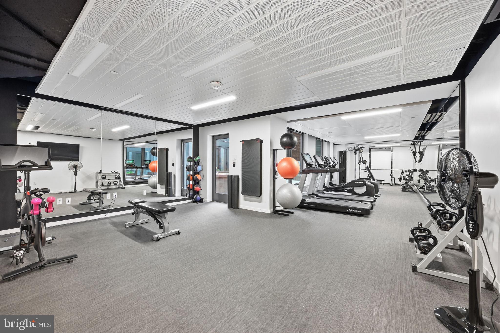 1211 Van Street Southeast, Unit 1007 Washington, DC 20003 - Photo 20 of 21 a view of a room with gym equipment