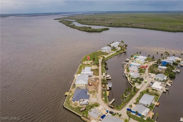 an aerial view of a house with outdoor space
