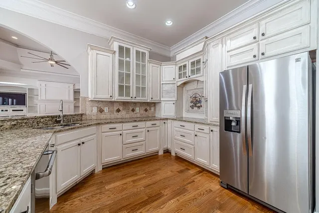 a bathroom with a tub and a shower