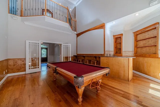 a view of a kitchen with granite countertop cabinets