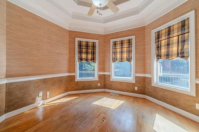 a view of a hallway with stairs