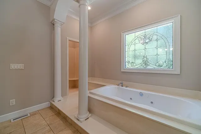 front view of a house with a garden