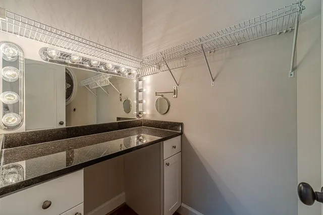 a view of a swimming pool with a yard